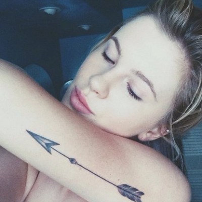 Model Ireland Baldwin Gets Cool Arrow and Lotus Flower Tattoos