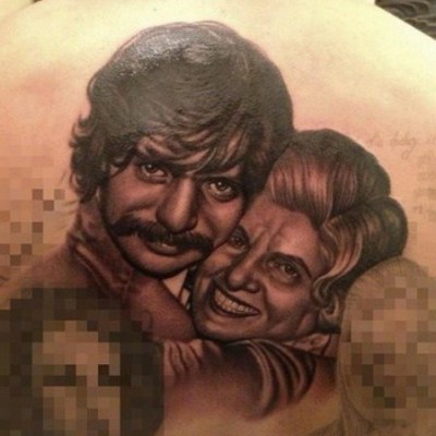 Drake’s Uncle & Grandmother Family Portrait Tattoo on His Back