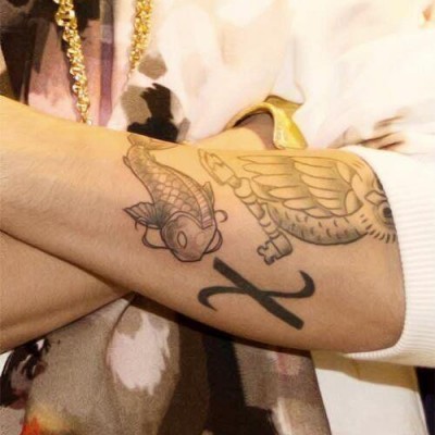 Justin Bieber’s Koi Fish Tattoo on His Arm