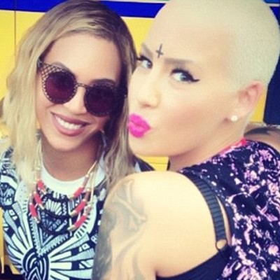 What is Amber Rose Thinking with Her New Inverted Cross Forehead Tat?